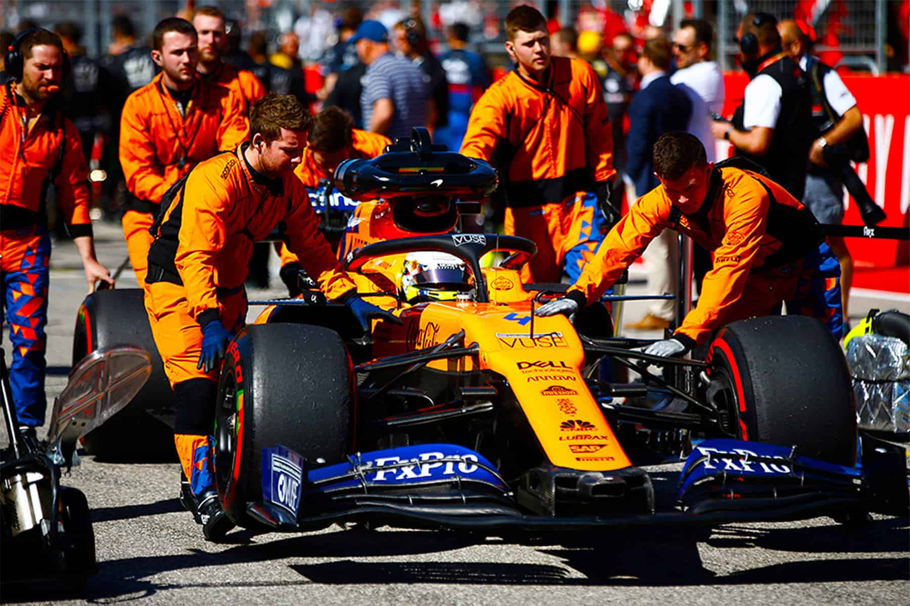 Team McLaren coming into the pits during qualifying runs.